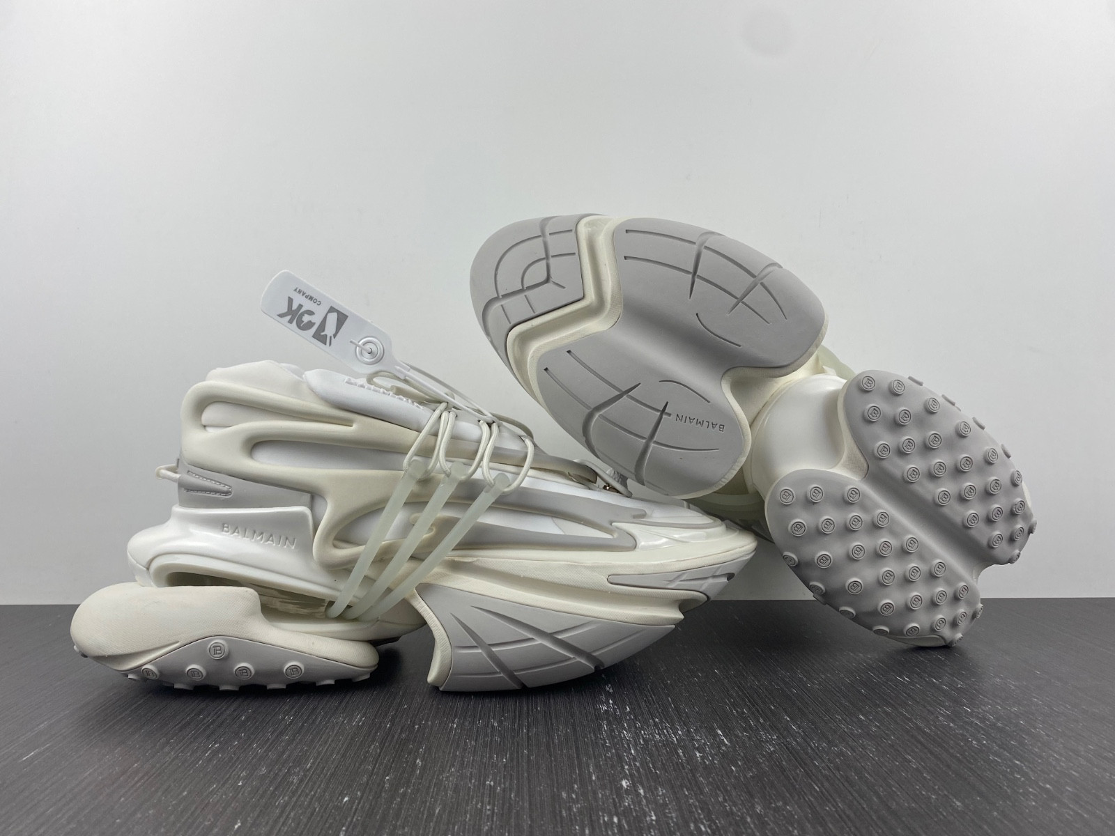 BALMAIN NEOPRENE AND LEATHER UNICORN LOW-TOP SNEAKERS