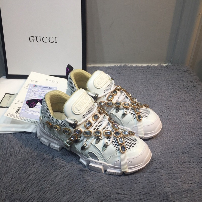 G*u*i sneakers